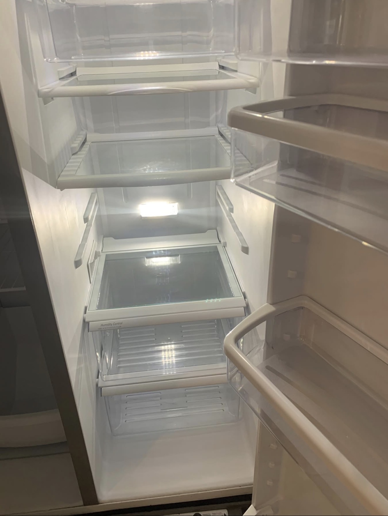 Clean refrigerator interior completed by Dukes Cleaning LLC